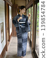 A young woman in a yukata 139854784