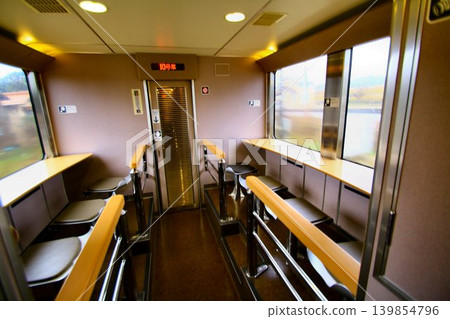 A comfortable overnight train journey... 'Sunrise Izumo/Seto' sleeper train, 285 series, mini lounge. 139854796
