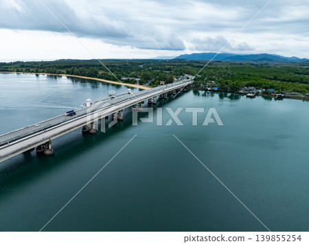 Aerial view of Sarasin bridge road transportation background concept The bridge is a between Phang Nga and Phuket island Thailand The bridge is the most important in making business and transportation Aerial view of Sarasin bridge road transportation background concept The bridge is a between Phang Nga and Phuket island Thailand The bridge is the most important in making business and transportation 139855254