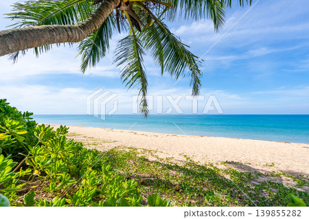 Beautiful sandy beach and sea with clear blue sky background Amazing beach blue sky sand sun daylight relaxation landscape view in Phuket island Thailand for Summer and travel background Beautiful sandy beach and sea with clear blue sky background Amazing beach blue sky sand sun daylight relaxation landscape view in Phuket island Thailand for Summer and travel background 139855282