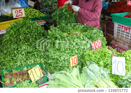 Vegetables and herbs sold in Thai markets Vegetables and herbs sold in Thai markets 139855772