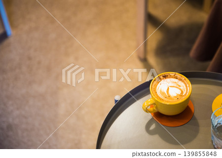 Caramel latte at a cafe Caramel latte at a cafe 139855848