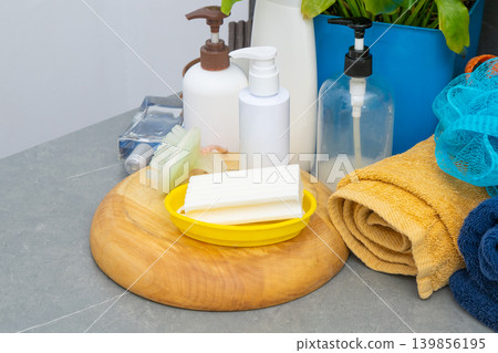 Soaps and Dispensers bottles. Natural eco set of shower gels and lotions and a washcloth 139856195