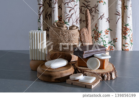 Natural Soap Bars Collection on Wooden Podiums with Rustic Bath Accessories and Eco Decor. Assortment of Soaps and Loofah 139856199