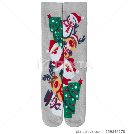 Pair of long warm Christmas socks with Santa Claus and christmas trees pattern, flat lay isolated on white background Pair of long warm Christmas socks with Santa Claus and christmas trees pattern, flat lay isolated on white background 139856278