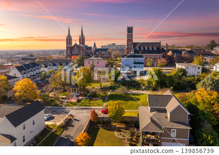 Panoramic aerial cityscape of Macon, Georgia featuring historic buildings, classic southern architecture and urban streets in a traditional American setting. Panoramic aerial cityscape of Macon, Georgia featuring historic buildings, classic southern architecture and urban streets in a traditional American setting. 139856739