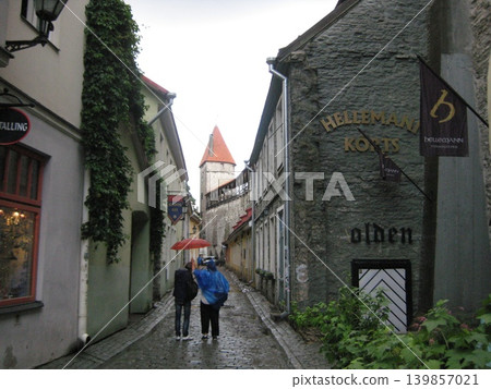 Streetscape along the city walls that remain in Tallinn's historic district 139857021