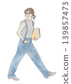 A woman carrying documents; a woman wearing glasses. 139857473