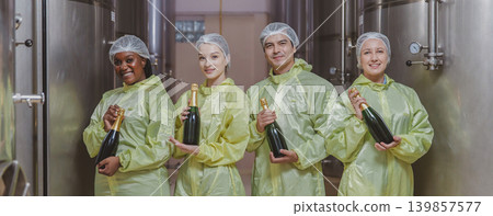 Winemaker working in modern large winery factory liquor drink industry quality. Winemaker working in modern large winery factory liquor drink industry quality. 139857577