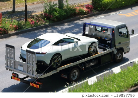 Car carrier loaded with sports cars 139857796