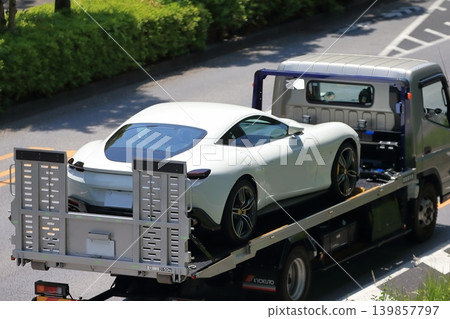 Car carrier loaded with sports cars 139857797