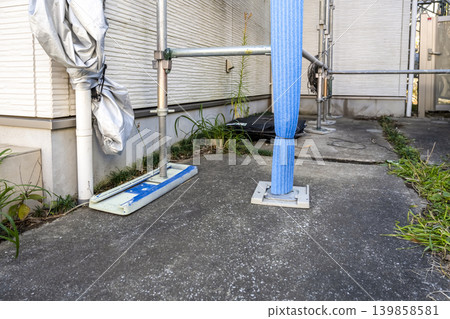 The base of the temporary scaffolding installed during the renovation work. The base of the temporary scaffolding installed during the renovation work. 139858581
