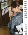A young woman in a yukata 139858855
