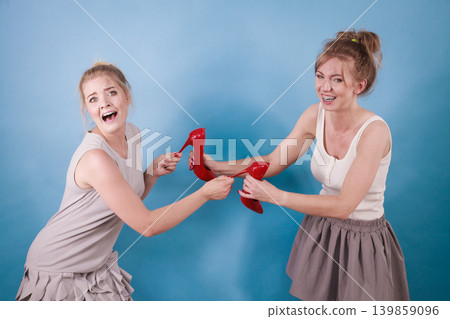 Women having argue high heels shoes 139859096