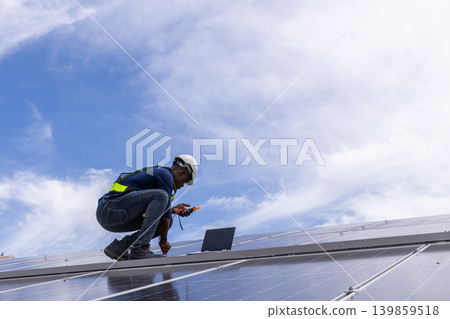 Engineer service check installation solar cell on the roof of factory. Engineer service check installation solar cell on the roof of factory. 139859518