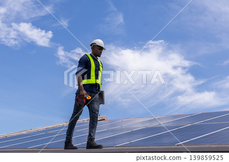 Engineer service check installation solar cell on the roof of factory. Engineer service check installation solar cell on the roof of factory. 139859525