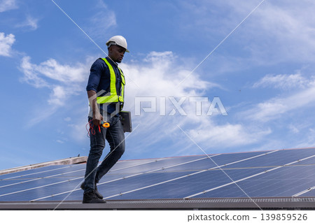 Engineer service check installation solar cell on the roof of factory. Engineer service check installation solar cell on the roof of factory. 139859526