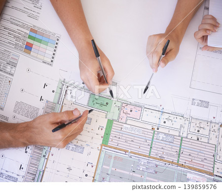 Architecture, hands and team in office with floor plan, strategy and project management meeting. Engineering, blueprint and people problem solving together in collaboration for remodeling from above Architecture, hands and team in office with floor plan, strategy and project management meeting. Engineering, blueprint and people problem solving together in collaboration for remodeling from above 139859576