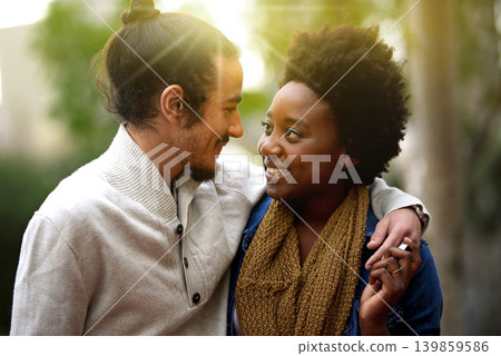 Park, hug and happy interracial couple together with trees, sunshine and morning embrace with love. Romance, smile and outdoor date in nature, man and woman with diversity, connection and care. Park, hug and happy interracial couple together with trees, sunshine and morning embrace with love. Romance, smile and outdoor date in nature, man and woman with diversity, connection and care. 139859586