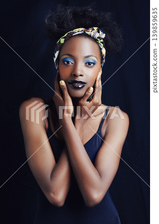 African woman, fashion and studio for makeup, beauty and art for eye shadow and lipstick campaign. Black female model, dark background and cosmetic, portrait and face for cultural and elegant style African woman, fashion and studio for makeup, beauty and art for eye shadow and lipstick campaign. Black female model, dark background and cosmetic, portrait and face for cultural and elegant style 139859635