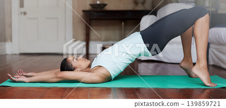 Yoga, stretching and woman on floor for balance in home for training, exercise and healthy body. Pilates, house workout and person in yogi pose for wellness, fitness and warm up in living room Yoga, stretching and woman on floor for balance in home for training, exercise and healthy body. Pilates, house workout and person in yogi pose for wellness, fitness and warm up in living room 139859721