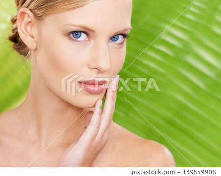 Woman, portrait and cosmetic health with leaf background for organic wellness for beauty skin, treatment or makeup. Female person, face and hand for fresh dermatology or natural, studio or mockup 139859908