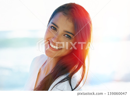 Indian female person, beach and smile for ocean, waves and breeze for summertime in Bali for vacation. Woman, sea and holiday relaxation abroad with lens flare, sand and happy for memories and trip Indian female person, beach and smile for ocean, waves and breeze for summertime in Bali for vacation. Woman, sea and holiday relaxation abroad with lens flare, sand and happy for memories and trip 139860047