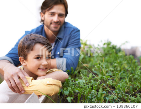 Dad, son and portrait in garden standing by herbs bed, smiling and outdoors together for growth season. Parent, child and nurture agriculture for sustainability, environment and eco friendly Dad, son and portrait in garden standing by herbs bed, smiling and outdoors together for growth season. Parent, child and nurture agriculture for sustainability, environment and eco friendly 139860107