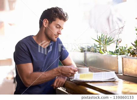 Man, coffee shop and relaxing with newspaper and cup, hot beverage and article for information. Male person, restaurant and reading paper for announcement, print and story for update and tea at cafe Man, coffee shop and relaxing with newspaper and cup, hot beverage and article for information. Male person, restaurant and reading paper for announcement, print and story for update and tea at cafe 139860133