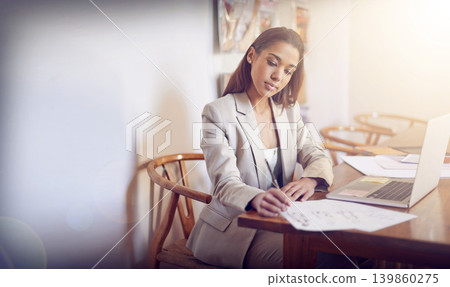 Professional, planning and woman writing research on paper for business, schedule and agenda. Entrepreneur, working and ideas in notes for report or analysis on table with laptop in home living room 139860275