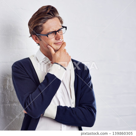 Man, thinking and glasses for fashion and vision, eye care and future with designer frame on white background. Cosmetic, casual clothes with spectacles for insight and question with prescription lens Man, thinking and glasses for fashion and vision, eye care and future with designer frame on white background. Cosmetic, casual clothes with spectacles for insight and question with prescription lens 139860305