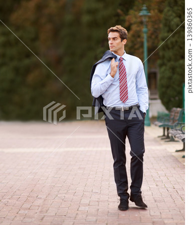 Jacket over his shoulder, business and man walking, park and professional with confidence. Person, outdoor and lawyer with a suit or fresh air with pose or entrepreneur with ideas, decision or choice 139860365
