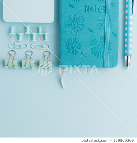 Blue School Stationery Flat Lay on Blue Background Blue School Stationery Flat Lay on Blue Background 139860369
