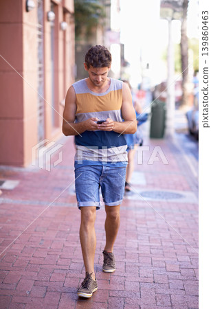 Man, phone and social media in city or communication, texting and browsing on internet or online. Male person, urban town and walking on street, website and mobile app for conversation on tech Man, phone and social media in city or communication, texting and browsing on internet or online. Male person, urban town and walking on street, website and mobile app for conversation on tech 139860463