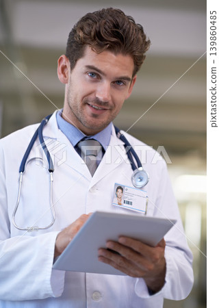 Smile, tablet and portrait of doctor in hospital for medical research on the internet for diagnosis. Happy, professional and male healthcare worker with telehealth on digital technology in clinic. Smile, tablet and portrait of doctor in hospital for medical research on the internet for diagnosis. Happy, professional and male healthcare worker with telehealth on digital technology in clinic. 139860485