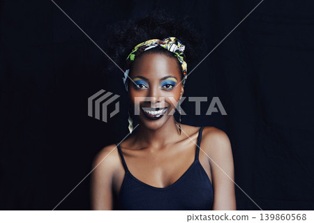 African woman, fashion and studio for makeup, beauty and smile for eye shadow campaign. Black female model, dark background and cosmetic, portrait and face for cultural, style and elegance African woman, fashion and studio for makeup, beauty and smile for eye shadow campaign. Black female model, dark background and cosmetic, portrait and face for cultural, style and elegance 139860568