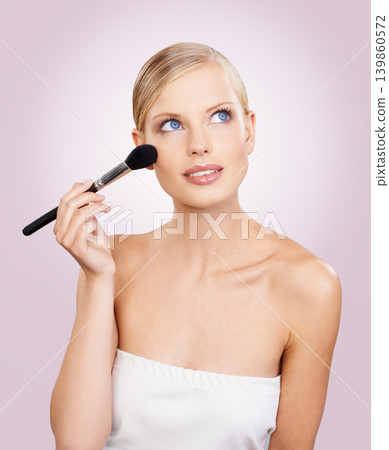 Makeup, brush and face of woman in studio with confidence, natural cosmetics or facial glow. Glamour, beauty and girl thinking on pink background with healthy skin shine, inspiration and wellness. Makeup, brush and face of woman in studio with confidence, natural cosmetics or facial glow. Glamour, beauty and girl thinking on pink background with healthy skin shine, inspiration and wellness. 139860572