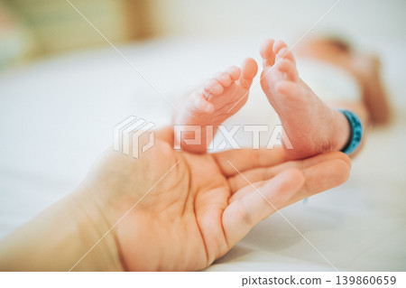 Small foot of newborn Small foot of newborn 139860659