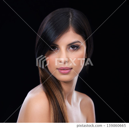 Beauty, hair care and portrait of woman with makeup in studio for health, wellness and salon treatment. Confident, cosmetic and female person with facial and hairstyle routine by black background. Beauty, hair care and portrait of woman with makeup in studio for health, wellness and salon treatment. Confident, cosmetic and female person with facial and hairstyle routine by black background. 139860665