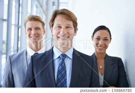 Teamwork, office and portrait of happy business people for pride, confidence and collaboration in hallway. Corporate lawyers, professional and men and woman for partnership, leadership and about us 139860780