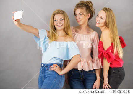 Fashionable women taking selfie 139861098