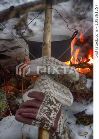 picnic in winter on nature of a bonfire picnic in winter on nature of a bonfire 139861357