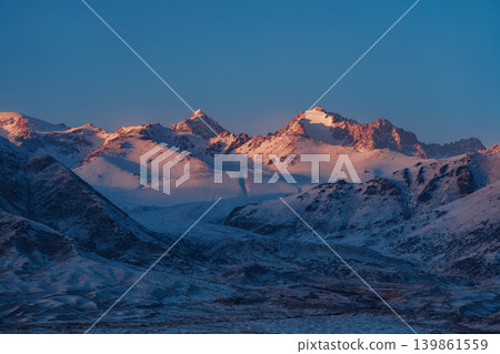 Mountains winter Kyrgyzstan landscape at sunset Mountains winter Kyrgyzstan landscape at sunset 139861559