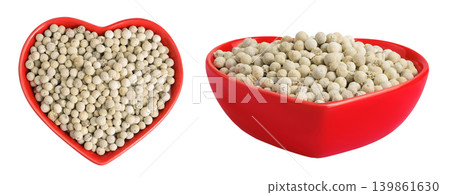 White peppercorns or pepper in ceramic bowl isolated on white background. Top view. Flat lay White peppercorns or pepper in ceramic bowl isolated on white background. Top view. Flat lay 139861630