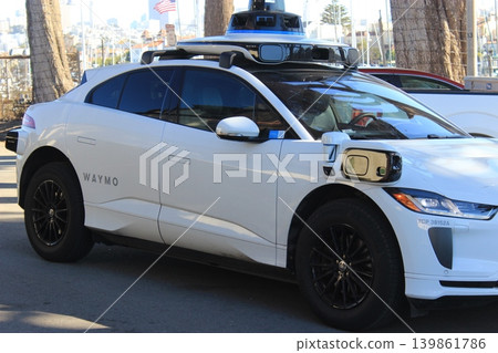 San Francisco, California, USA: sightseeing, Alamo Square and cityscape, bridges and fog, Waymo autonomous driving. San Francisco, California, USA: sightseeing, Alamo Square and cityscape, bridges and fog, Waymo autonomous driving. 139861786