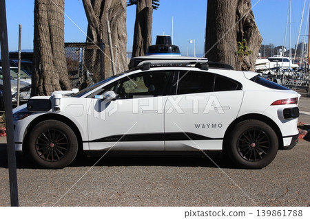 San Francisco, California, USA: sightseeing, Alamo Square and cityscape, bridges and fog, Waymo autonomous driving. San Francisco, California, USA: sightseeing, Alamo Square and cityscape, bridges and fog, Waymo autonomous driving. 139861788
