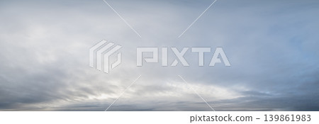 Clouds in the overcast evening sky view. Clouds in the overcast evening sky view. 139861983