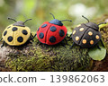 Realistic Felt Ladybugs Resting on Moss in Natural Forest Scene 139862063