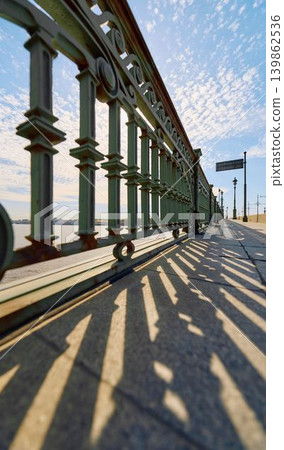 antique wrought iron railings of the Trinity Bridge, Troitsky Bridge on a spring morning antique wrought iron railings of the Trinity Bridge, Troitsky Bridge on a spring morning 139862536