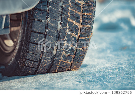 Car tire on snow at winter close-up view Car tire on snow at winter close-up view 139862796